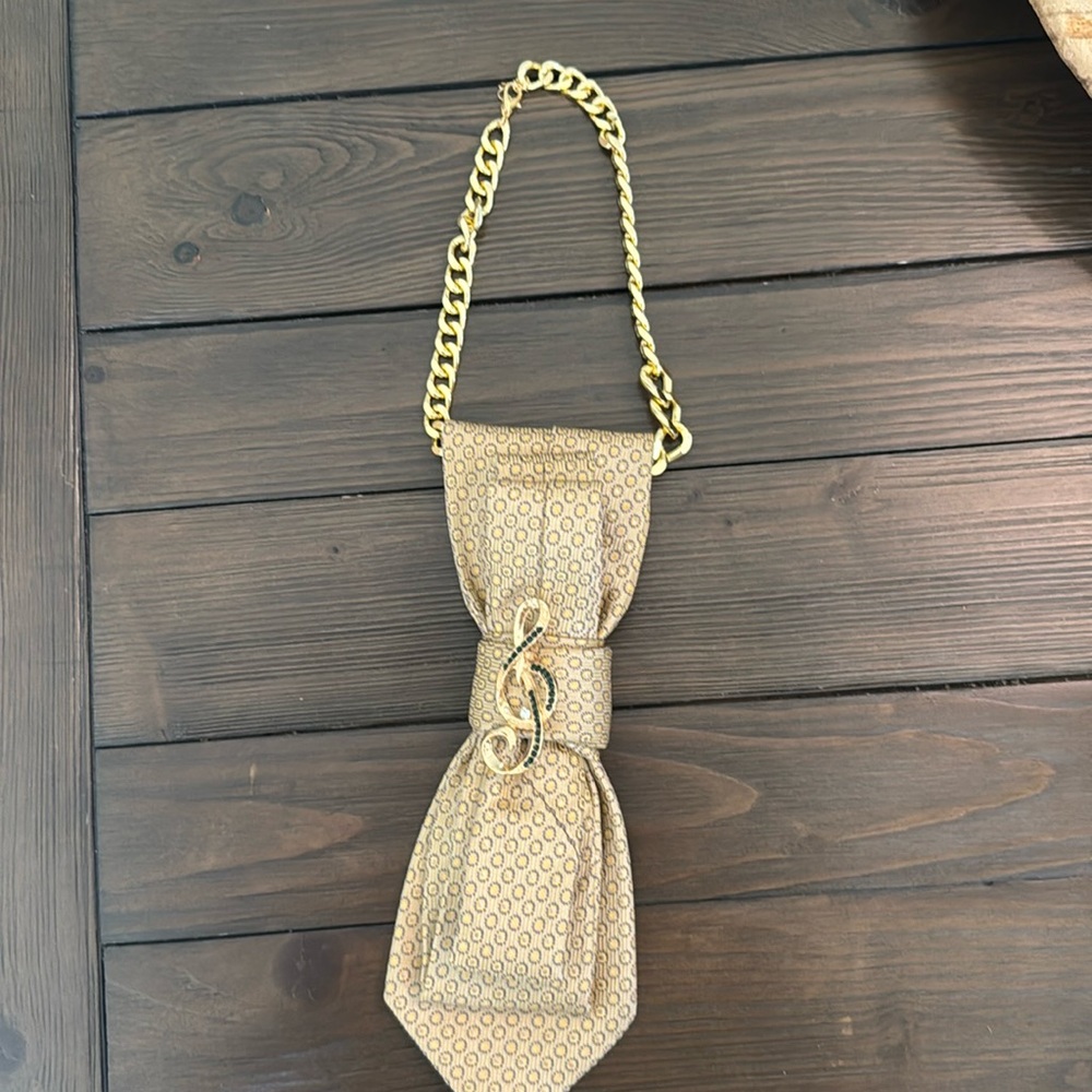 Handmade Upcycled Necktie Bib Necklace with Brooch
Unique & Handmade!